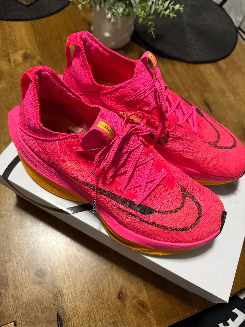Nike Bright Pink Athletic Running Shoes with Yellow Accents